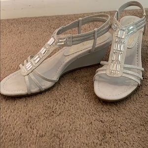 Woman’s silver formal sandals